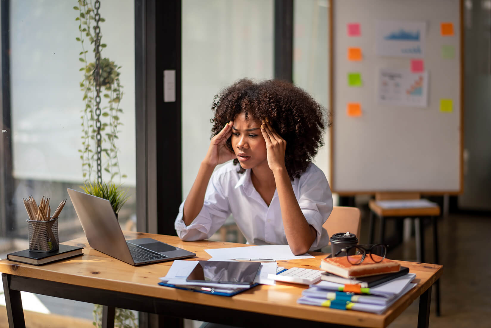 woman at table stressed out