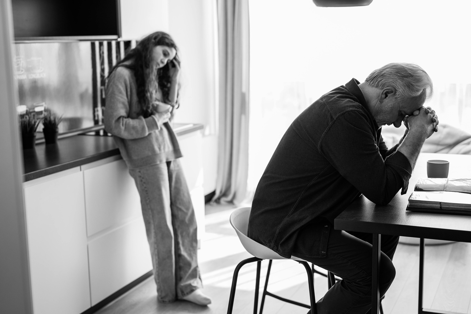 image of two people showing signs of stress