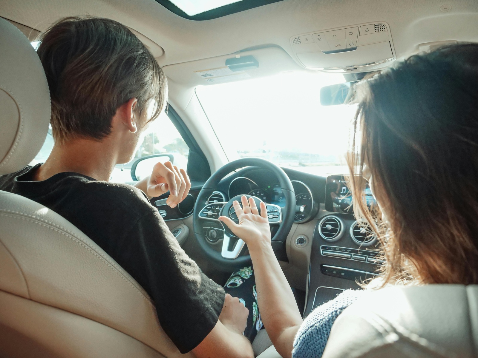image of teen in drivers seat